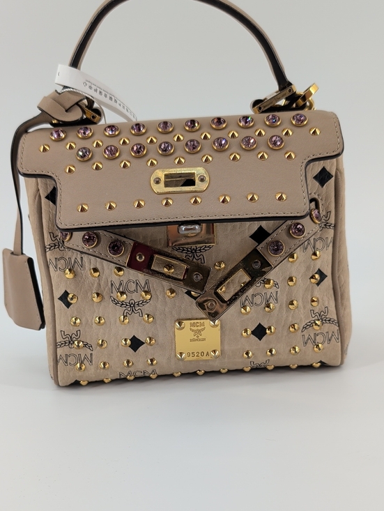 MCM Handbags - MCM Beige Visetos Top Handle Bag with Gold Hardware and Pink Crystal Studs